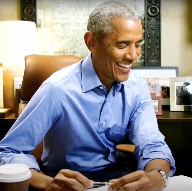 Barack Obama sitting on Humanscale Freedom Chair in Whitehouse